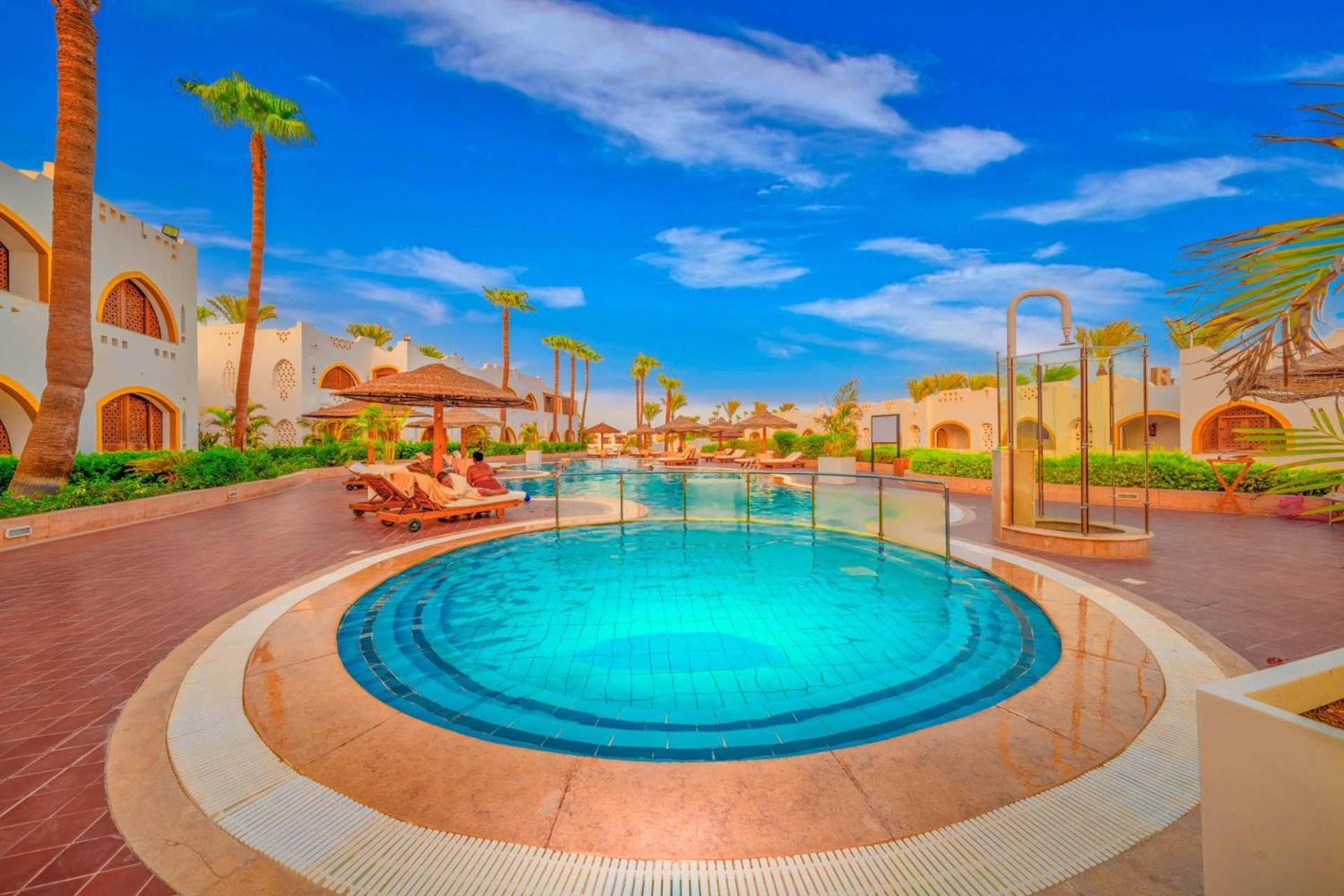 שארם א-שייח Domina Coral Bay Resort, Diving , Spa & Casino מראה חיצוני תמונה The swimming pool at the resort
