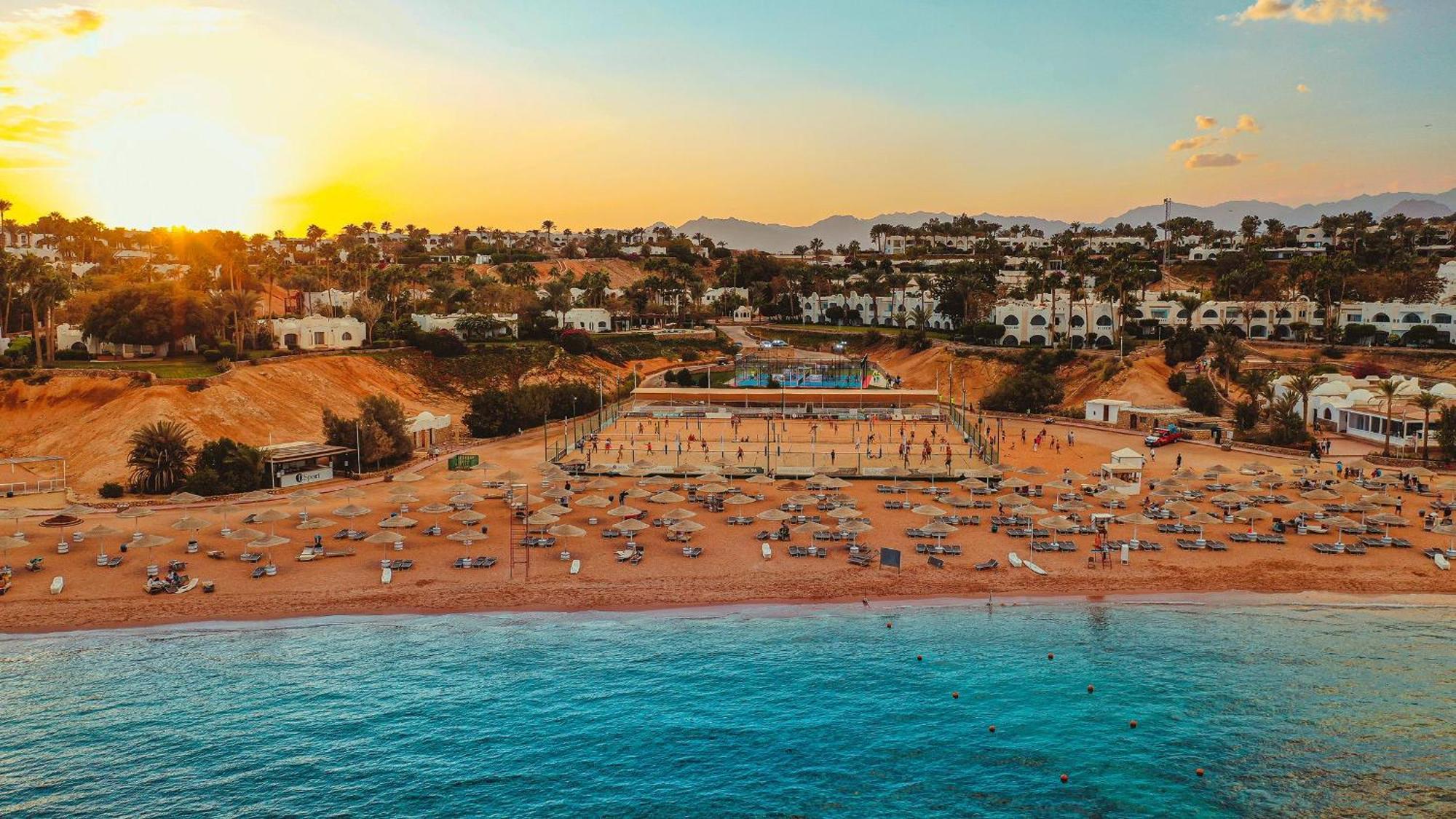שארם א-שייח Domina Coral Bay Resort, Diving , Spa & Casino מראה חיצוני תמונה Sunset at the beach
