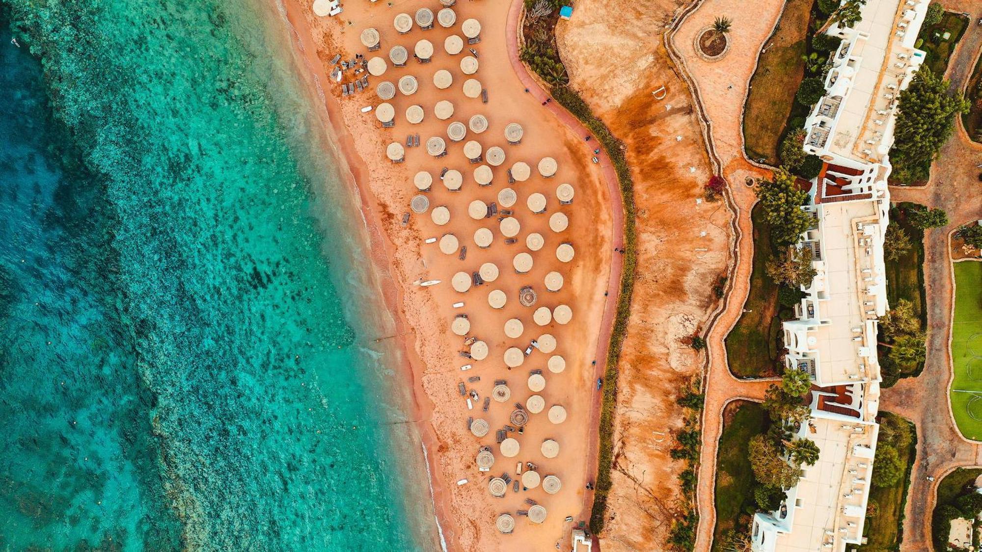 שארם א-שייח Domina Coral Bay Resort, Diving , Spa & Casino מראה חיצוני תמונה Aerial view of the beach