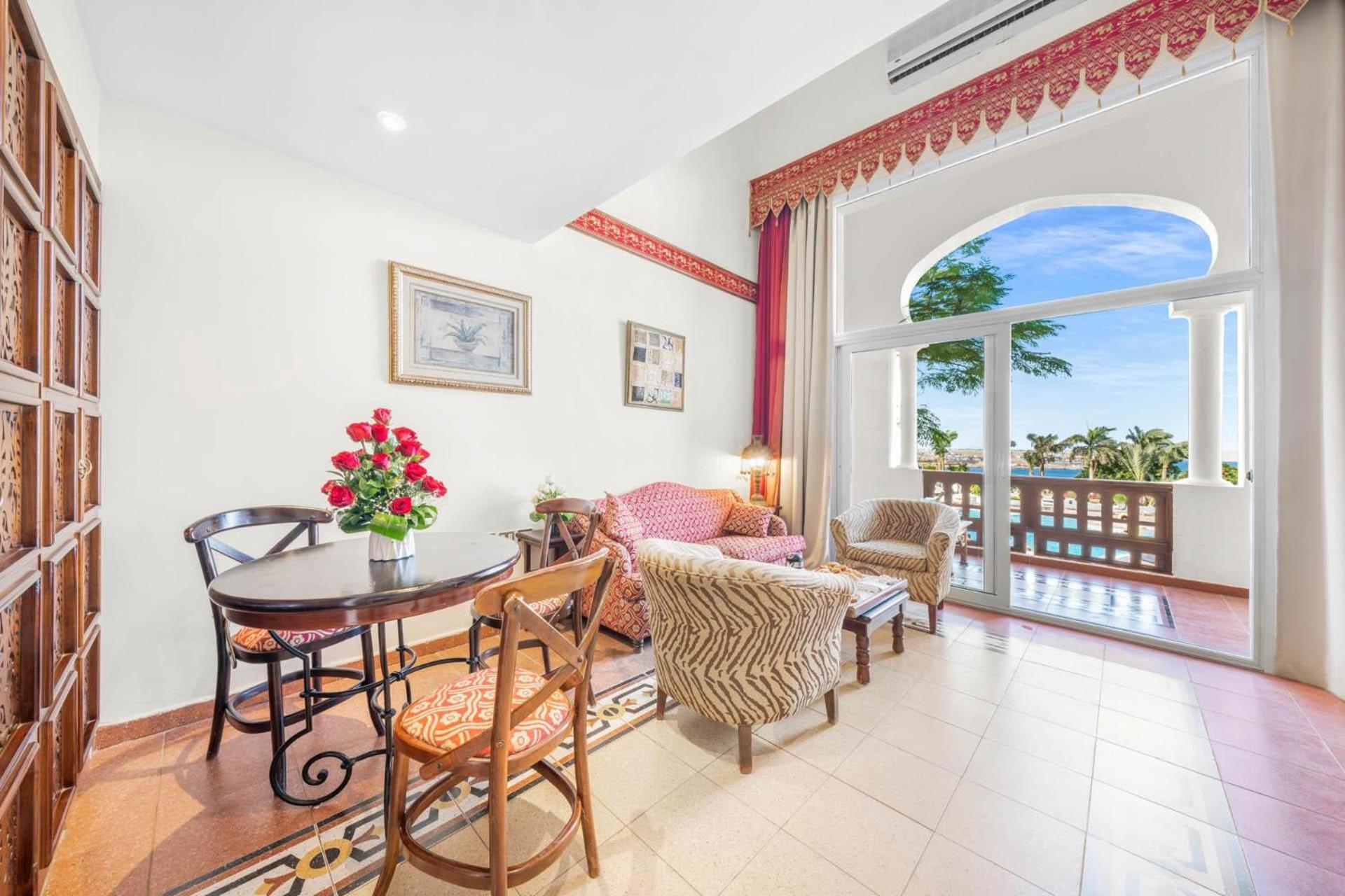 שארם א-שייח Domina Coral Bay Resort, Diving , Spa & Casino מראה חיצוני תמונה A typical living room in a condominium